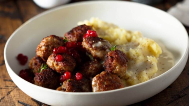 Meat balls on mash potato in a dish