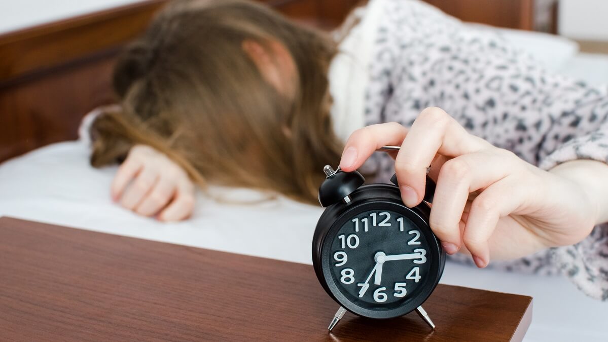 woman struggling to wake up