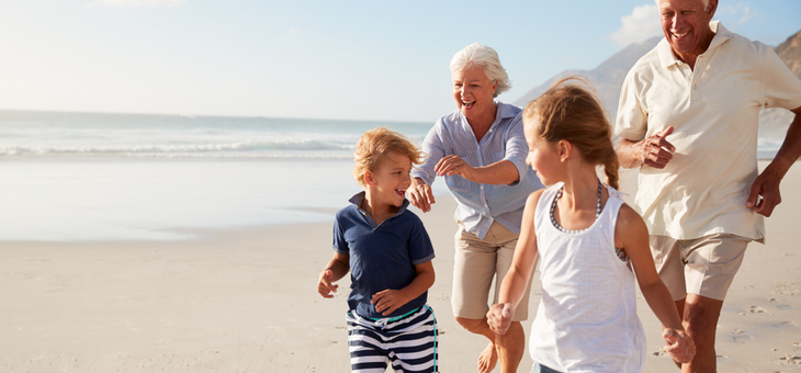 grandparents-and-grandchildren-on-beach