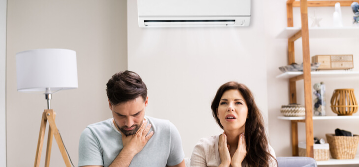 couple struggling with air con