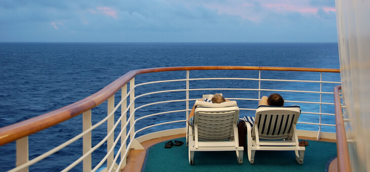 older couple relaxing on cruise ship