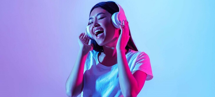 dancing woman with headphones on