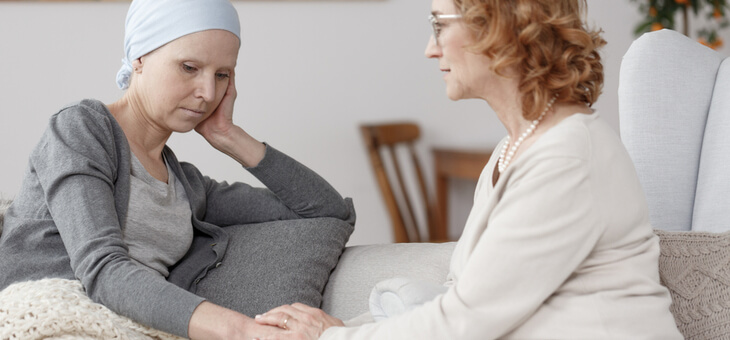 woman-comforting-cancer-patient