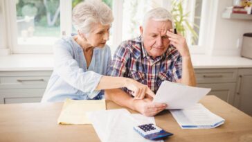 older couple stressing over their age pension mistakes