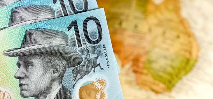 New Australian money over blurred map background