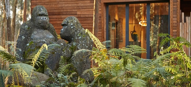 gorilla statues outside cabin