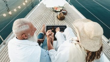 mature couple relaxing on yacht