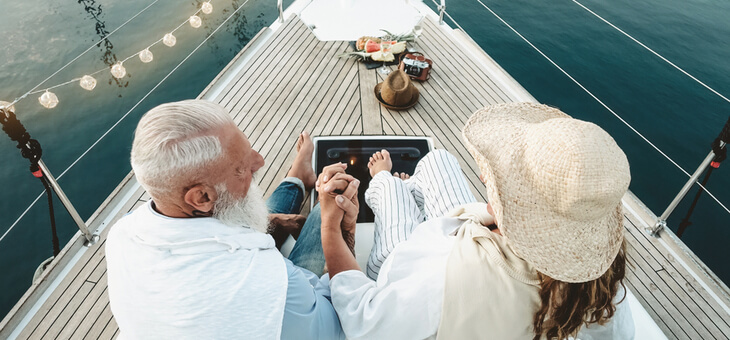 mature couple relaxing on yacht