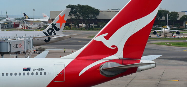 tails of a qantas and a jetstar plane