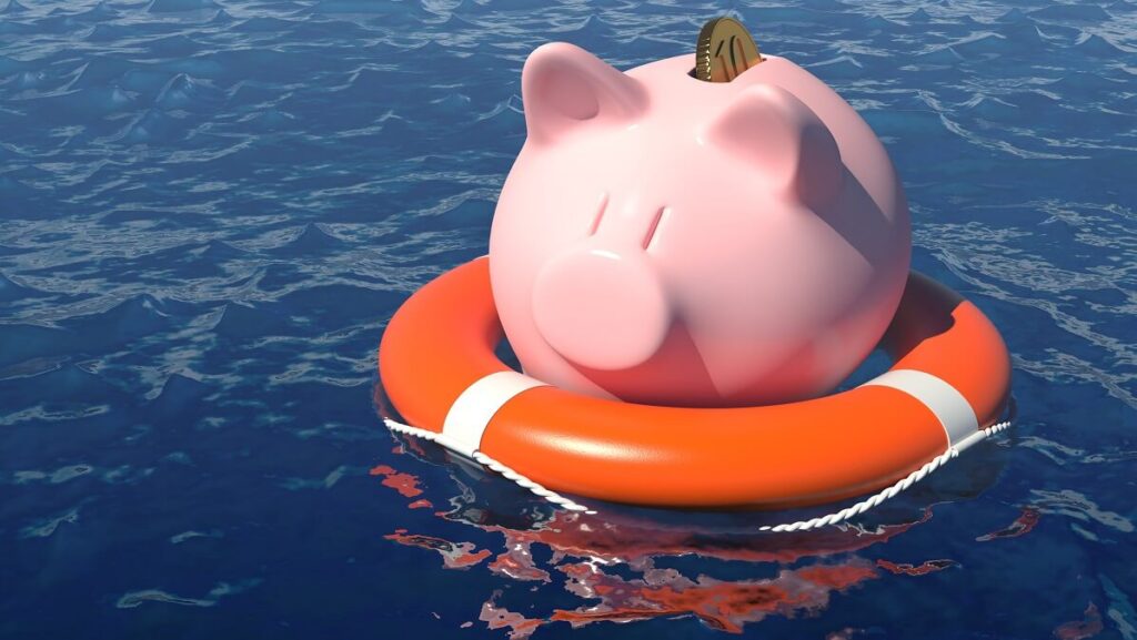piggy bank floating in life ring