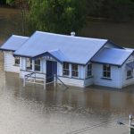 house inundated by flood waters