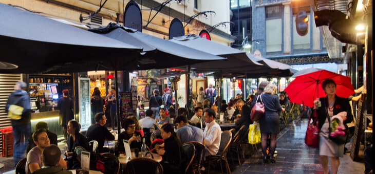 diners eating at outdoor cafes in degraves street melbourne