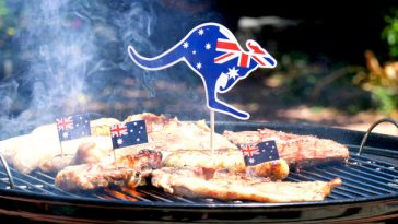 meat on a barbecue with kangaroo shaped australian flag pin