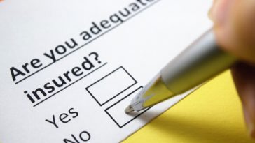 paper form asking are you adequately insured with pen marking no
