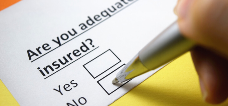 paper form asking are you adequately insured with pen marking no