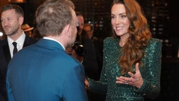 kate middleton in conversation with man