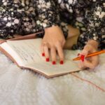 Woman writing a journal