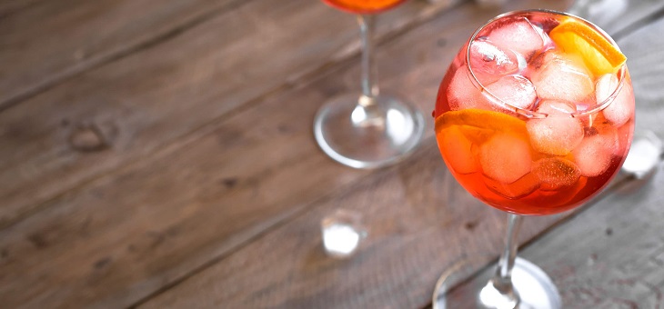 glass of aperol spritz on table