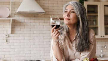 woman with glass of red wine