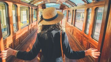 woman boarding luxury train