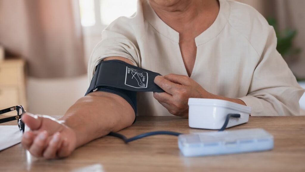 woman measuring blood pressure