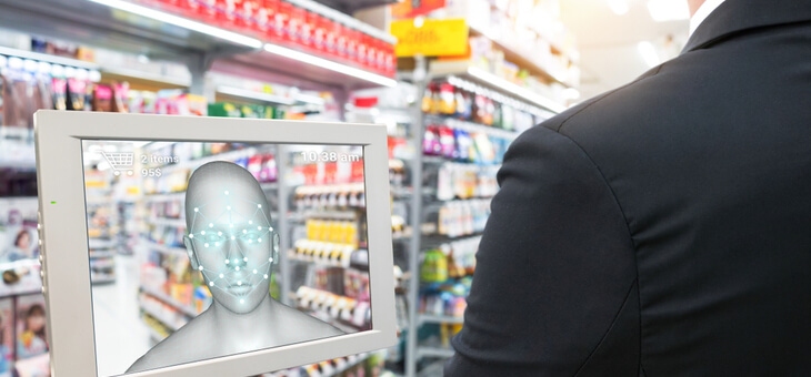man using facial recognition in a shop