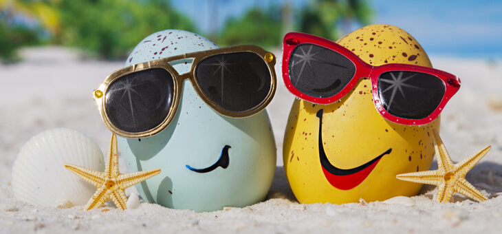 easter eggs wearing sunglasses on the beach