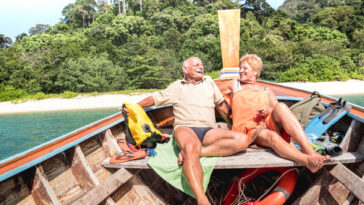 relaxed retired couple in boat