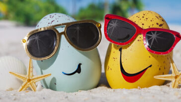 easter eggs wearing sunglasses on the beach