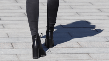 woman wearing jeans and boots