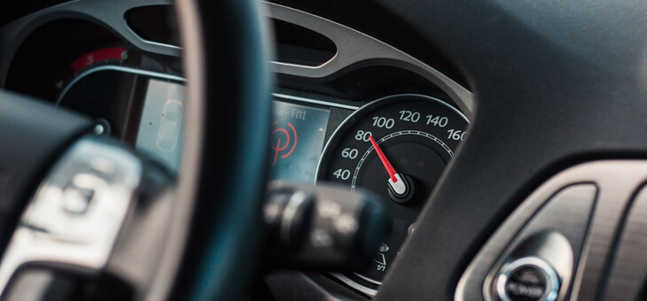 speedometer in car going 80