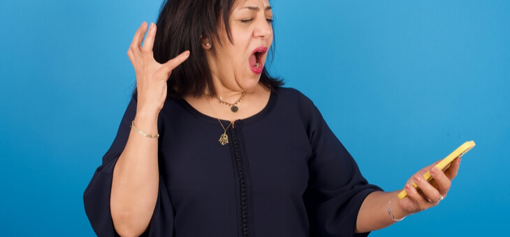frustrated woman yelling at phone