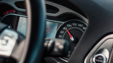 speedometer in car going 80