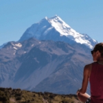 Woman admiring New Zealand mountain view