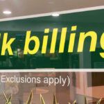 doctors surgery with bulk billing sign on window