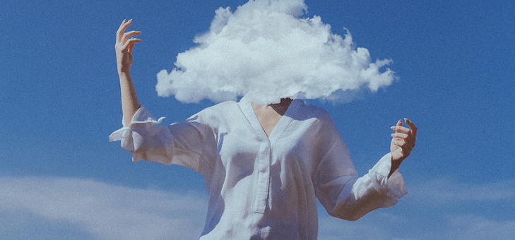 woman with head covered by clouds