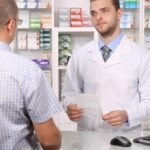 customer speaking with pharmacist