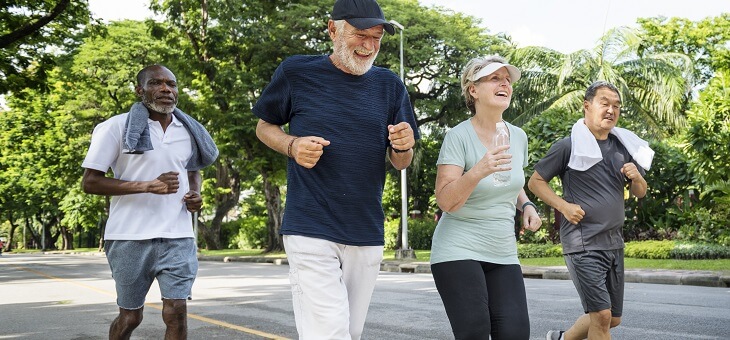 group of senior citizens jogging