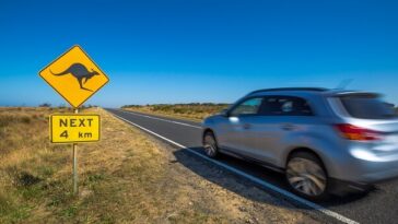 four wheel drive vehicle on remote australian road