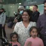 The Nadesalingam family speaking with reporters at Perth airport