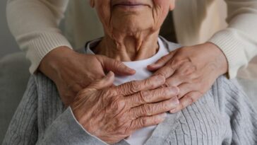 elderly woman suffering from illness