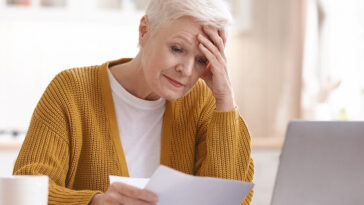 older lady stressed about bills