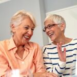 two ladies talking and laughing