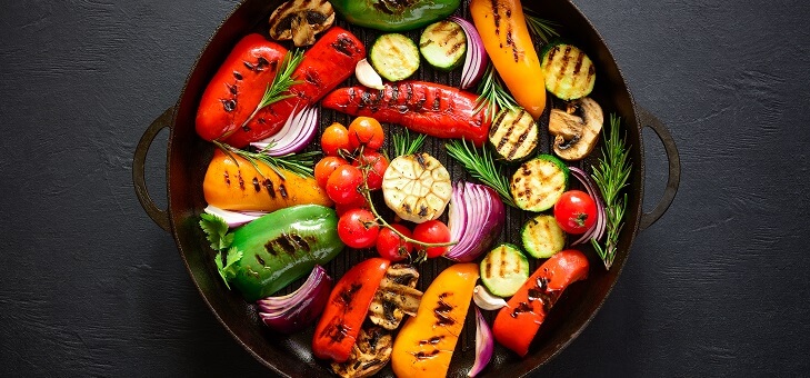 various vegetables cooking in pan