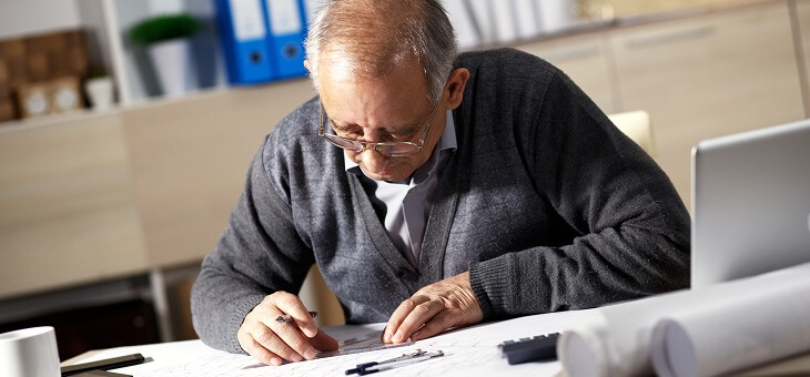 age pensioners working in office
