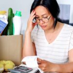 woman stressed about living costs