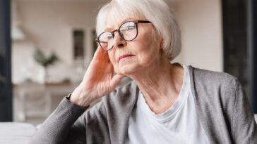 sad woman worried about age pension