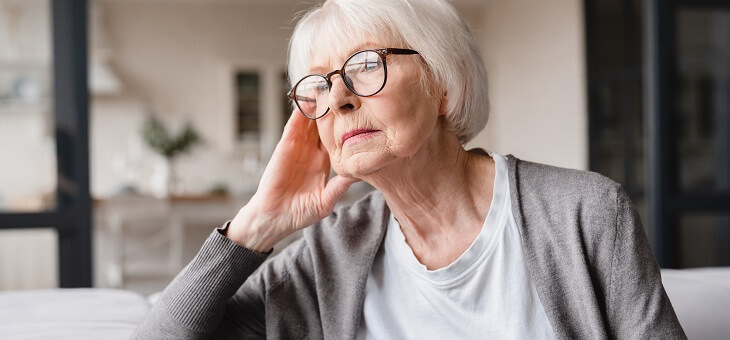 sad woman worried about age pension