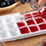 Pouring wine into an ice cube tray