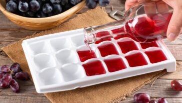 Pouring wine into an ice cube tray